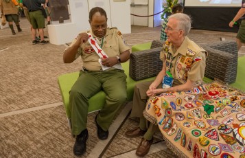 Ron Temple Adjusts His Sash With Dabney Kennedy