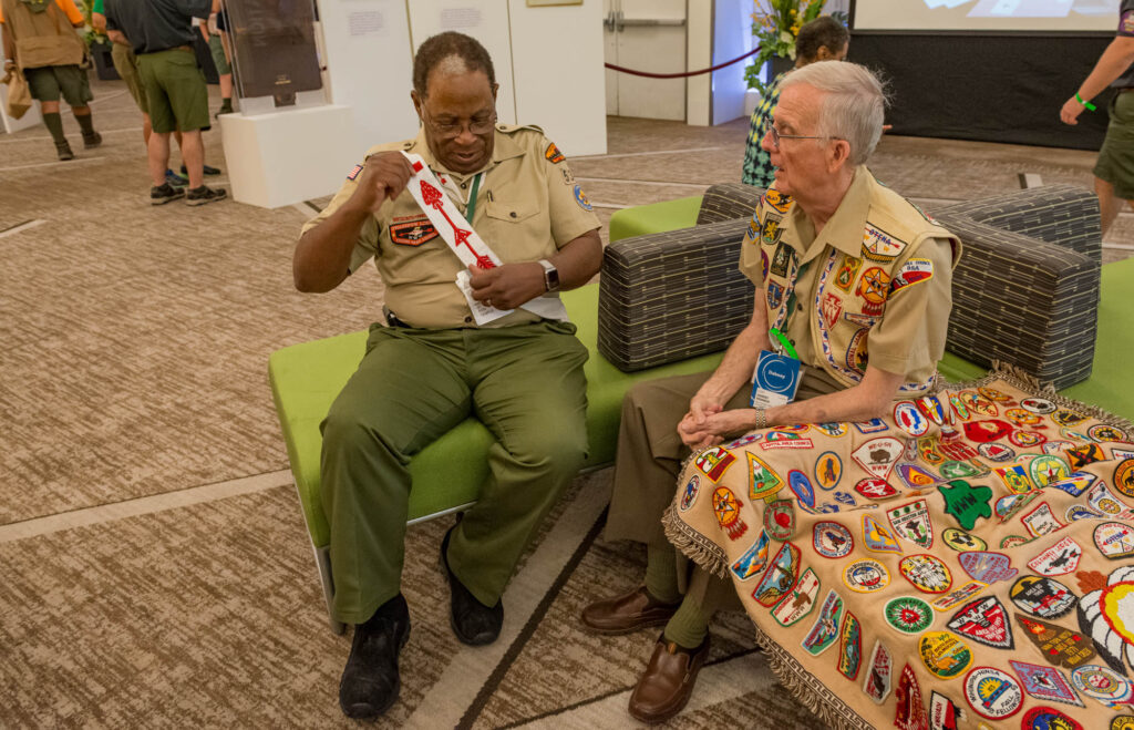 Ron Temple Adjusts His Sash With Dabney Kennedy