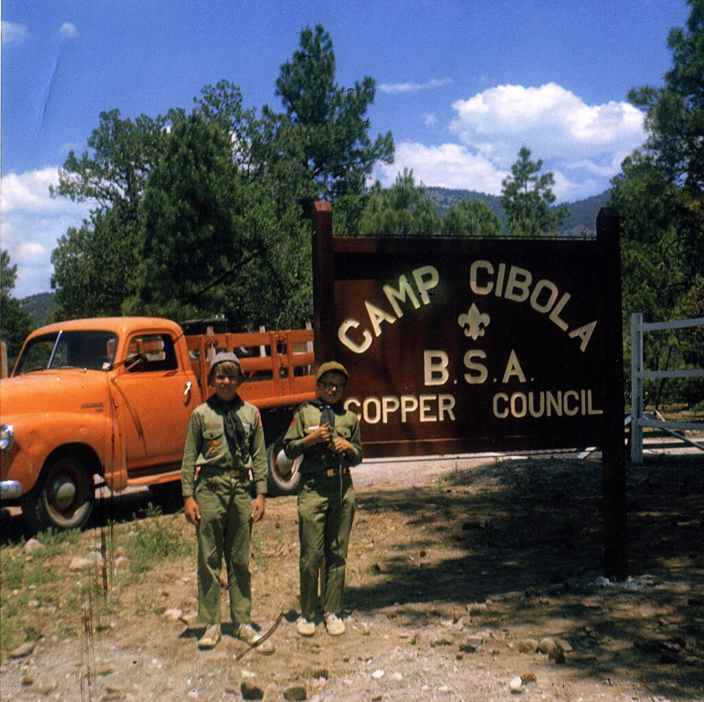 1967 (Est): Wade Griffth and Charles Lafferty, of Troop 36 in Morenci, Arizona, at Copper Council's Camp Cibola. The truck was borrowed from the Phelps Dodge Corporation, which had mining interests in the area, and was driven by Mr. Griffith.
